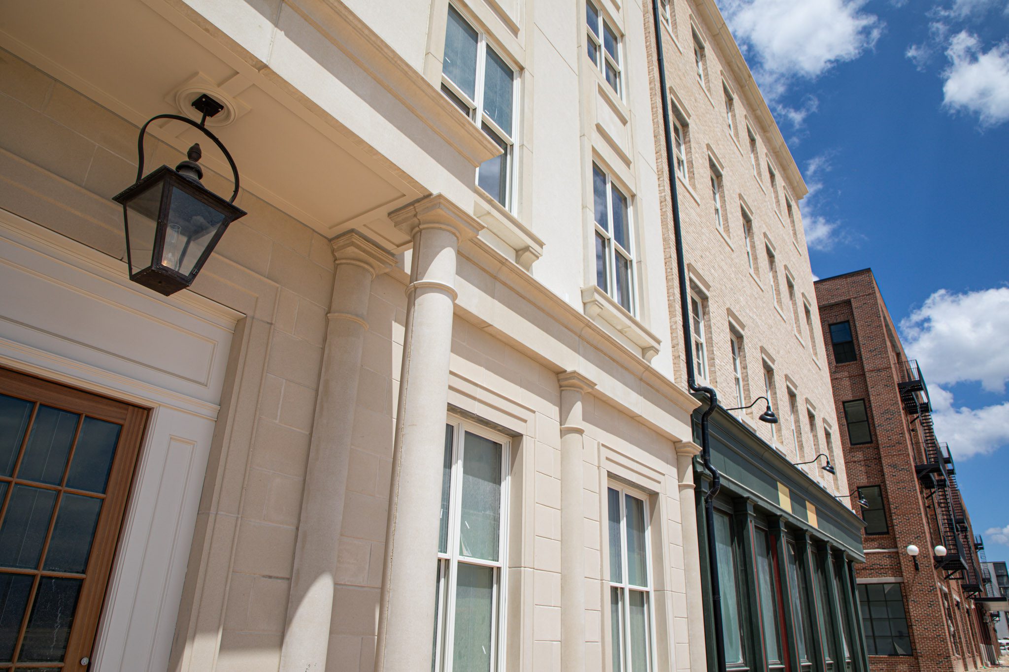 Front of buildings with different façade designs.