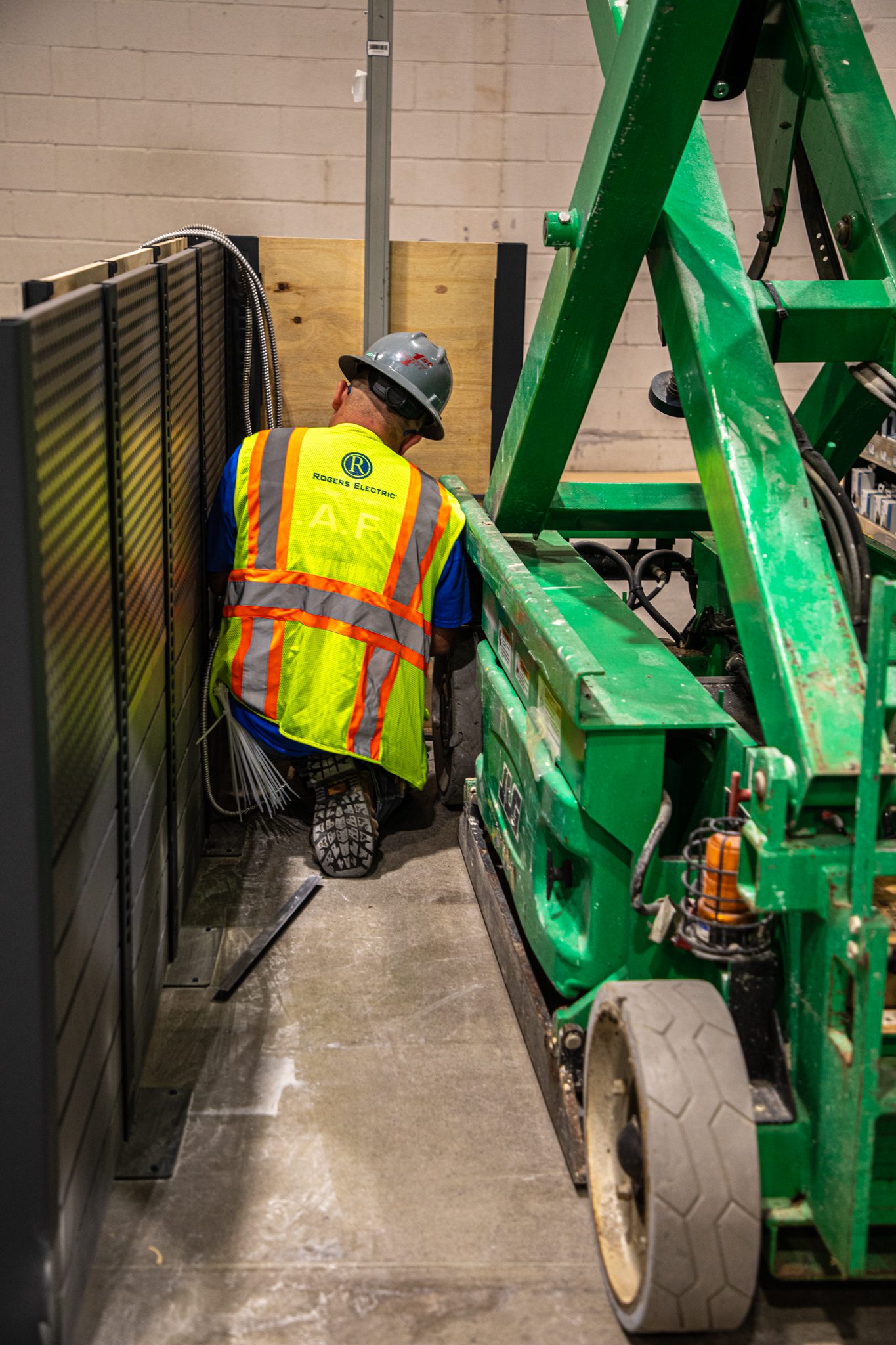 Technician organizing wire.